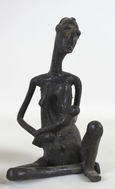 AFRIQUE, XXe.
Femme allaitant et homme fumant...