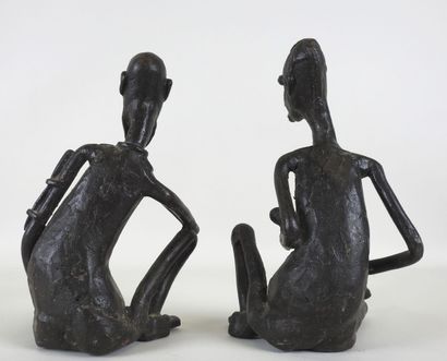 AFRIQUE, XXe.
Femme allaitant et homme fumant...