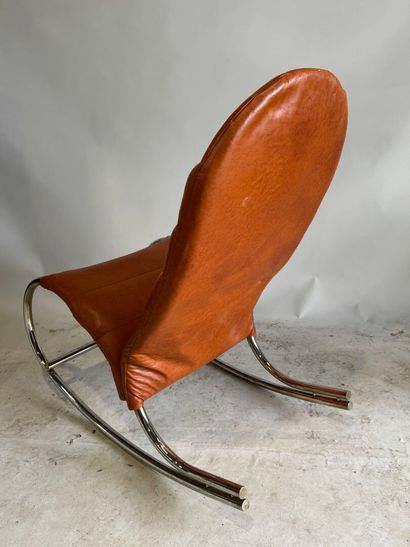 Rocking chair in skai, the base in tubular...