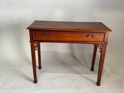 Console en bois teinté mouluré, ouvrant par...