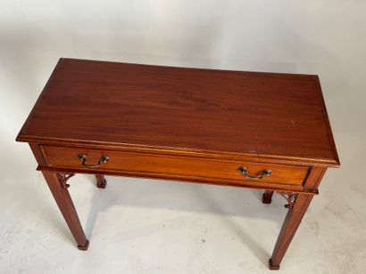 Console en bois teinté mouluré, ouvrant par...