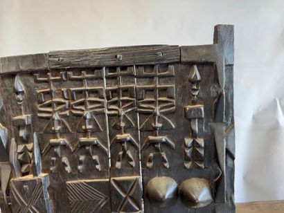 AFRICA, 20th century.
Carved wood door panel...