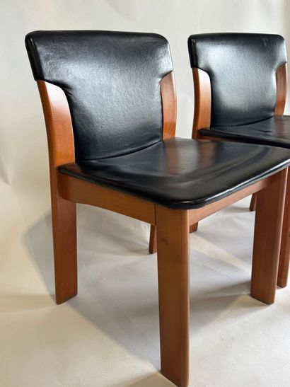 Set of four chairs in stained wood and black...
