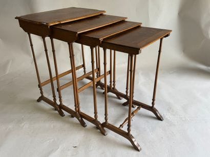 Suite of four nesting tables in wood and...