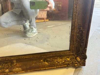 Rectangular mirror in wood and gilded stucco...