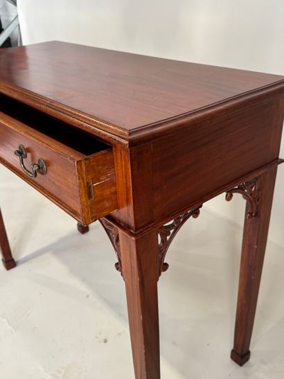 Console en bois teinté mouluré, ouvrant par...