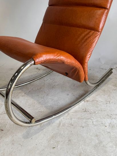 Rocking chair in skai, the base in tubular...