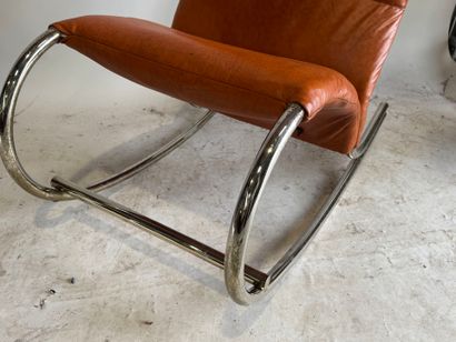 Rocking chair in skai, the base in tubular...
