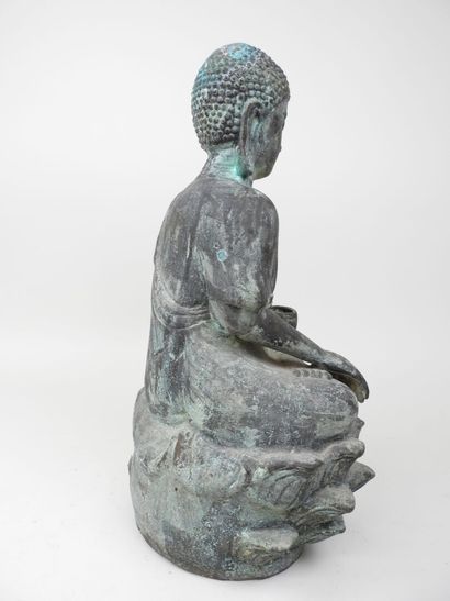 CHINE, XXe.
Bouddha assis sur un lotus. 
Sujet...