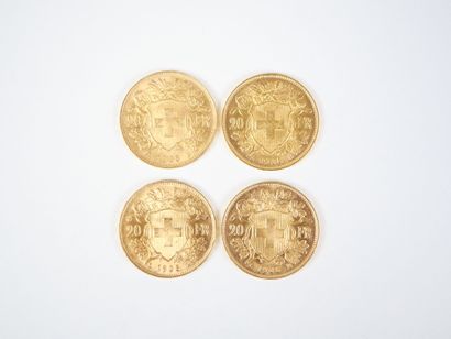 Ensemble de quatre pièces de 20 francs suisses...