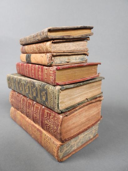 Approximately 7 religious volumes in various...