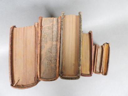 Approximately 7 religious volumes in various...