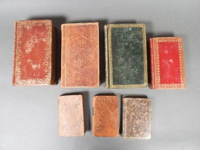 Approximately 7 religious volumes in various...
