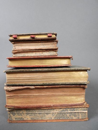 Approximately 7 religious volumes in various...