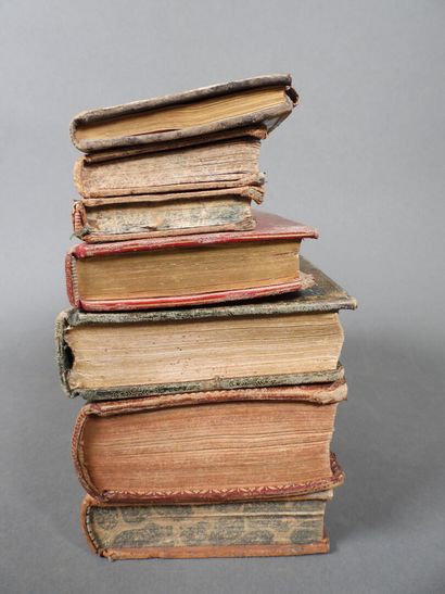 Approximately 7 religious volumes in various...