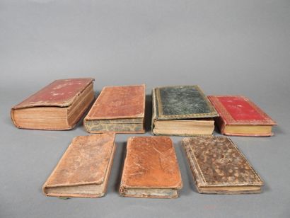 Approximately 7 religious volumes in various...