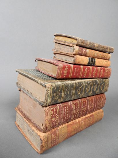 Approximately 7 religious volumes in various...