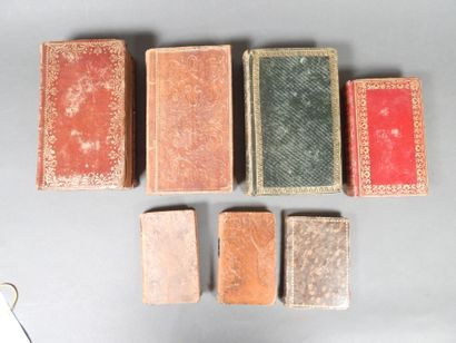 Approximately 7 religious volumes in various...