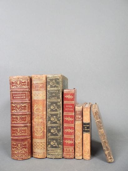 Approximately 7 religious volumes in various...