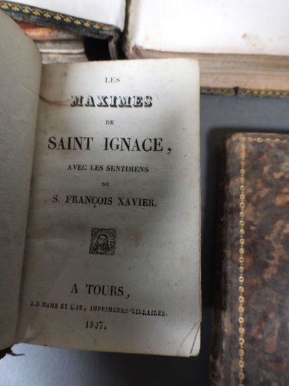 Approximately 7 religious volumes in various...