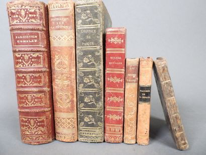 Approximately 7 religious volumes in various...