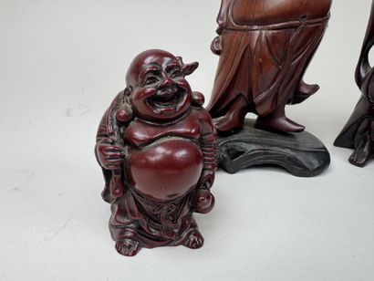 ASIE, XXe.
Quatre bouddhas en résine et bois...