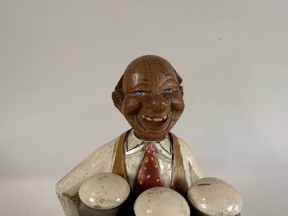 ANRI.
Personnage en bois sculpté et peint,...