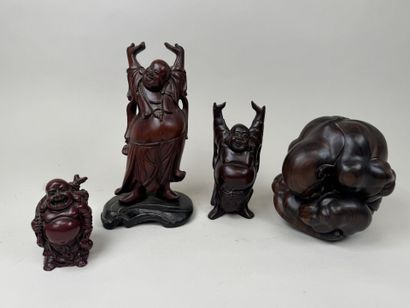 ASIE, XXe.
Quatre bouddhas en résine et bois...