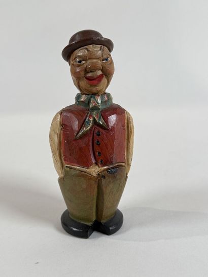 ANRI.
Personnage caricatural en bois sculpté...
