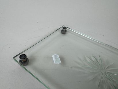 Lot comprenant :
- un dessous de plat de...