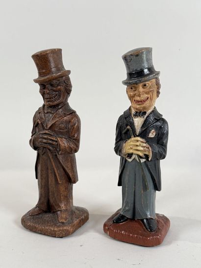 SYROCO.
Ensemble de deux tire-bouchons figuratifs...