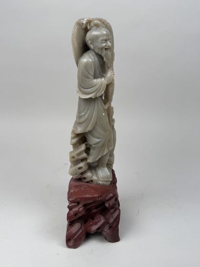 CHINE, XXe.
Pécheur.
Sujet en pierre de lard...