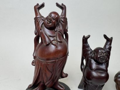 ASIE, XXe.
Quatre bouddhas en résine et bois...