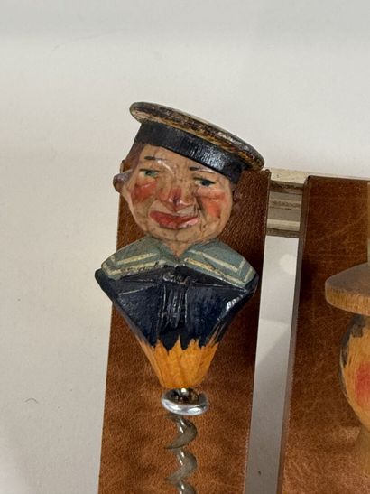 ANRI.
Ensemble de trois tire-bouchons figuratifs...