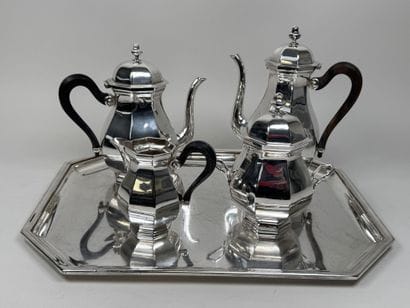 A silver plated coffee and tea set with beveled...