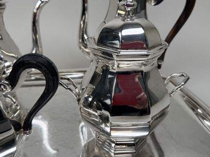 A silver plated coffee and tea set with beveled...