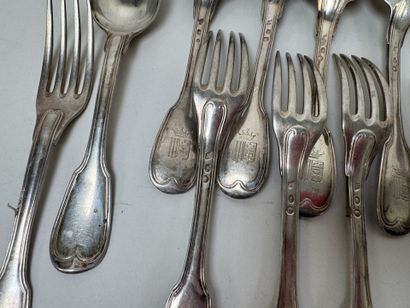Set of 12 table spoons and 11 forks in 950/1000...