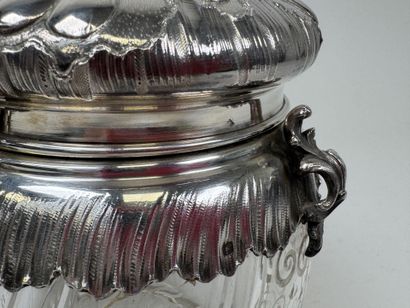 Crystal cookie jar with an engraved design...