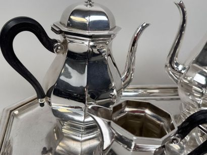 A silver plated coffee and tea set with beveled...