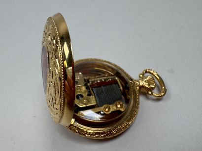 REUGE, SWITZERLAND.
Gold-plated metal music-box...