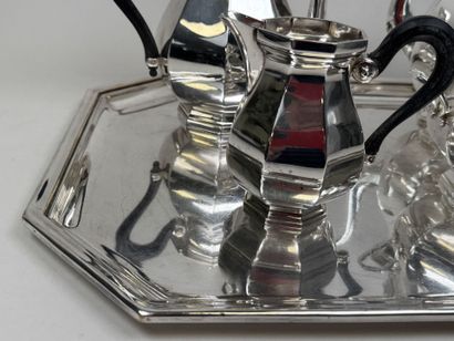 A silver plated coffee and tea set with beveled...