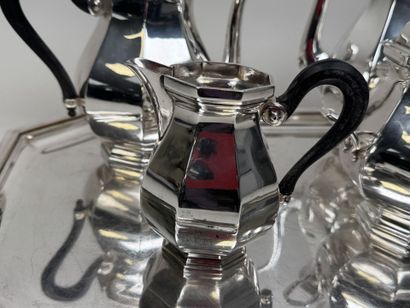 A silver plated coffee and tea set with beveled...