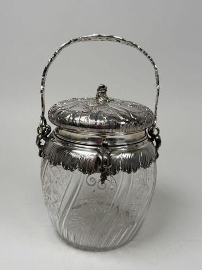 Crystal cookie jar with an engraved design...