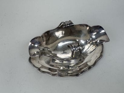 Saucière sur présentoir fixe en argent 950/1000,...