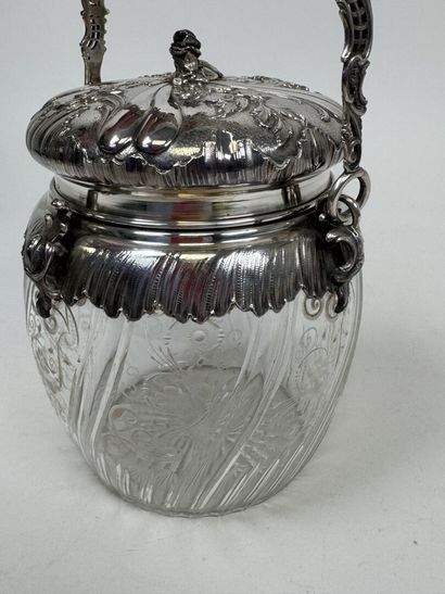 Crystal cookie jar with an engraved design...