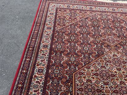 Large machine-woven rug made of multicolored...