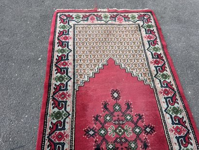 Hand-knotted wool gallery rug with a decorative...