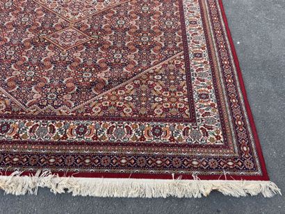 Large machine-woven rug made of multicolored...