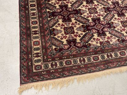 IRAN.
Hand-knotted wool rug with stylized...