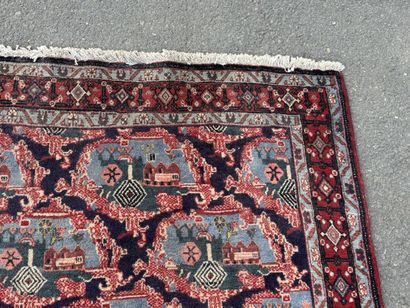 Hand-knotted wool rug with a landscape design.
158...
